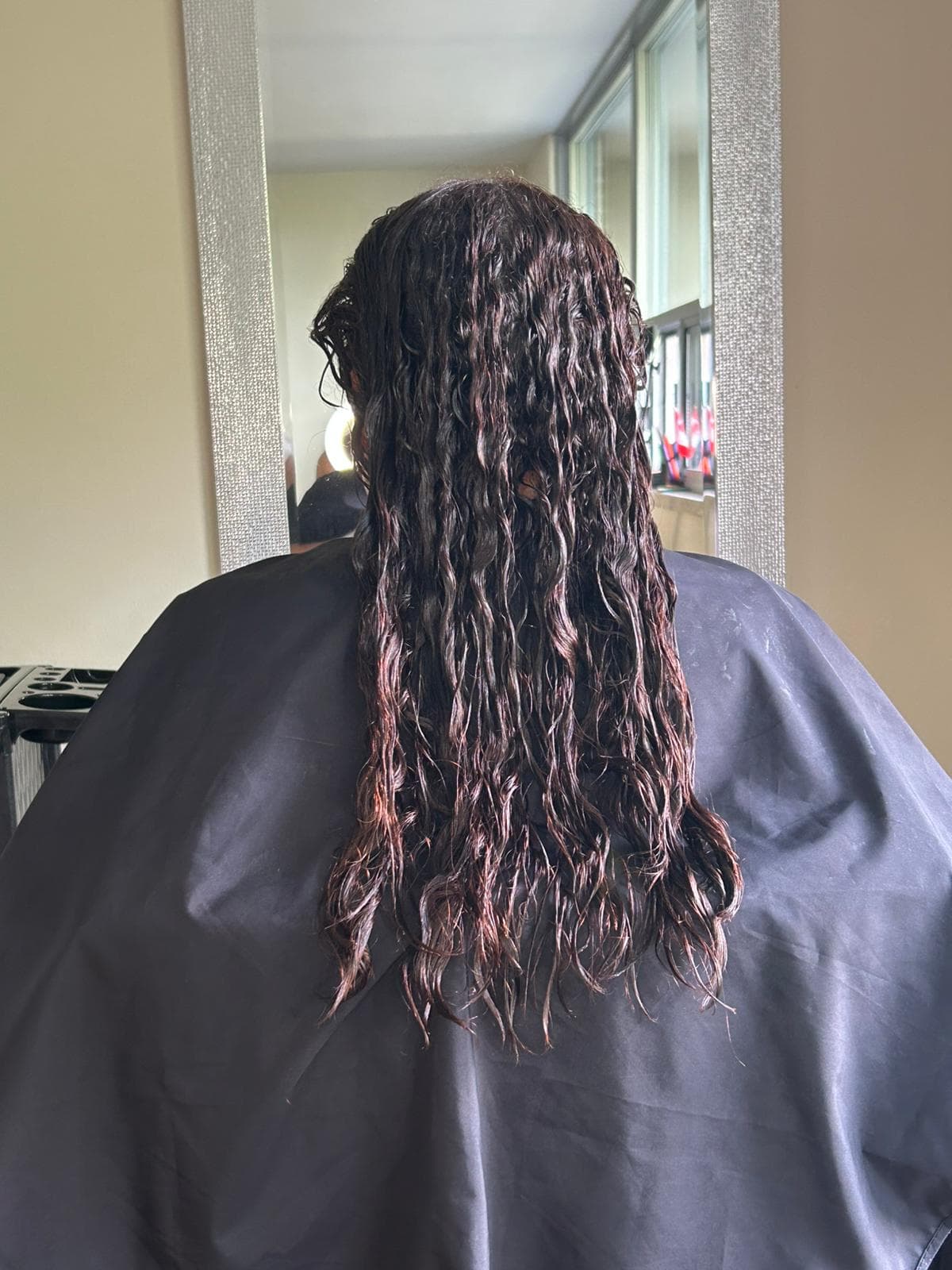Wet hair photographed during a Nanoplasty appointment in the Aura studio